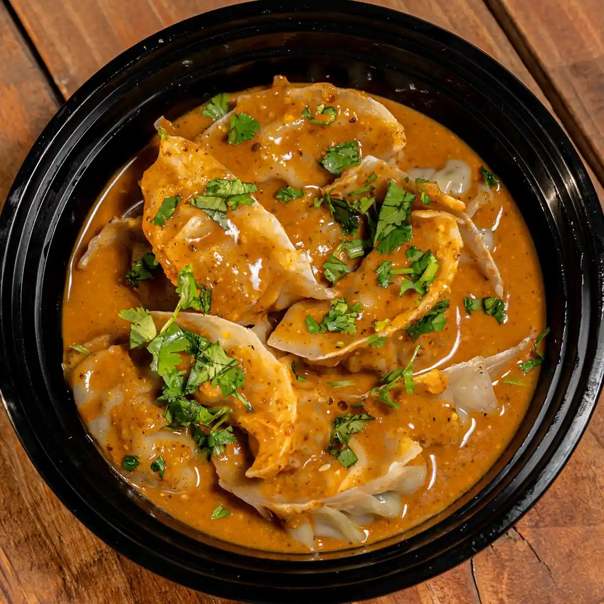 Chicken Jhol MoMo from Himalayan Spice Austin TX – Nepali soup dumplings powered by Skiplyn.